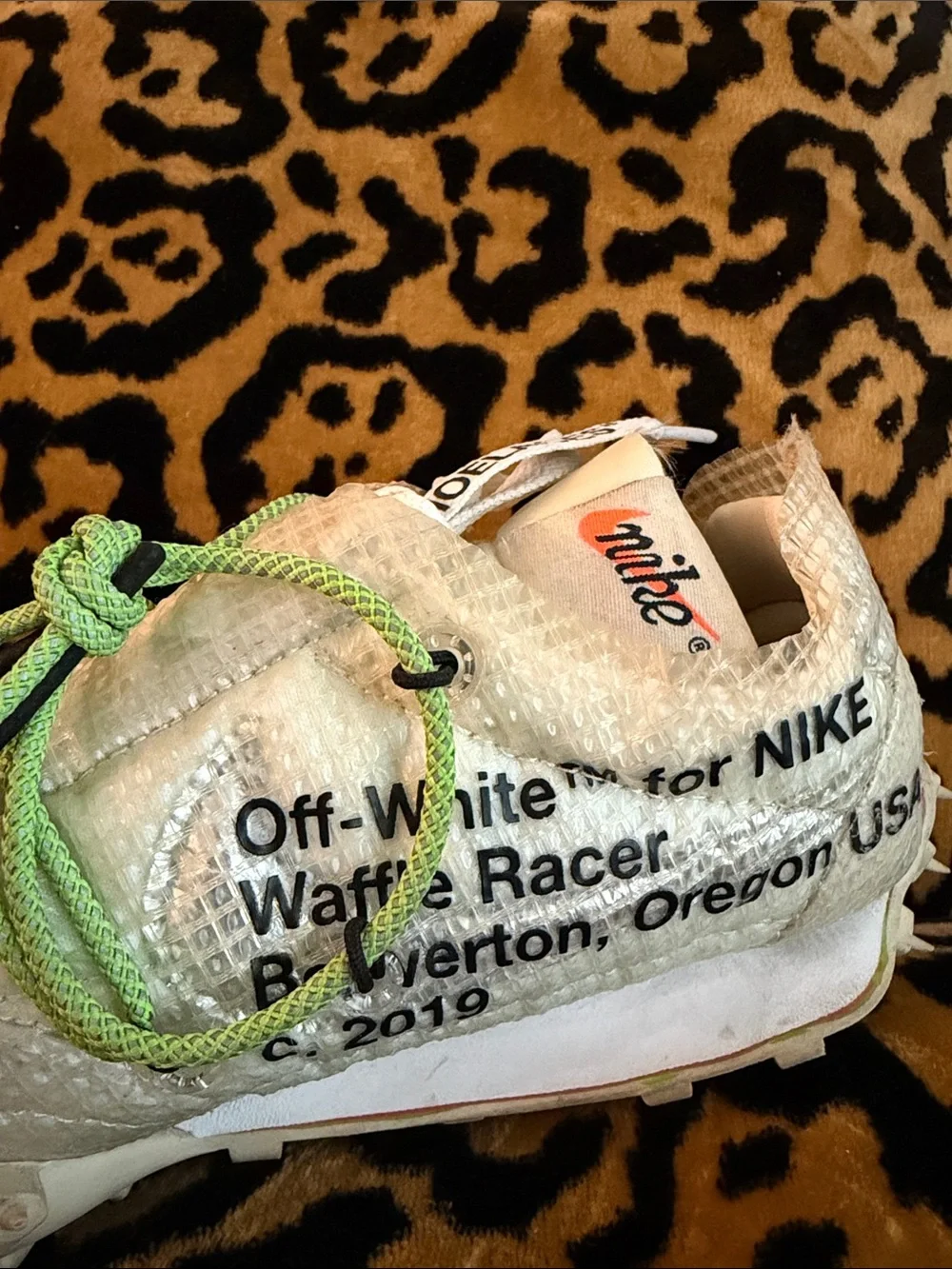 White sneakers with lime green laces